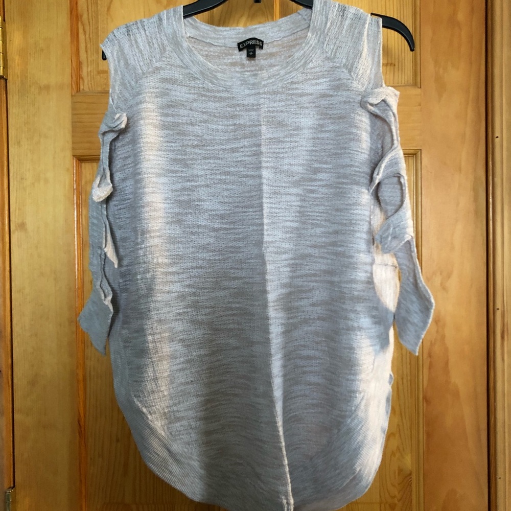 Cream colored extreme hem sweater